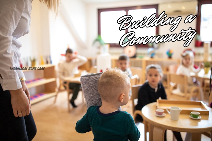 Young child interacting with a caregiver in a nurturing preschool setting, showcasing Kalaimagal Home Care's commitment to building community and fostering early childhood development in Coimbatore