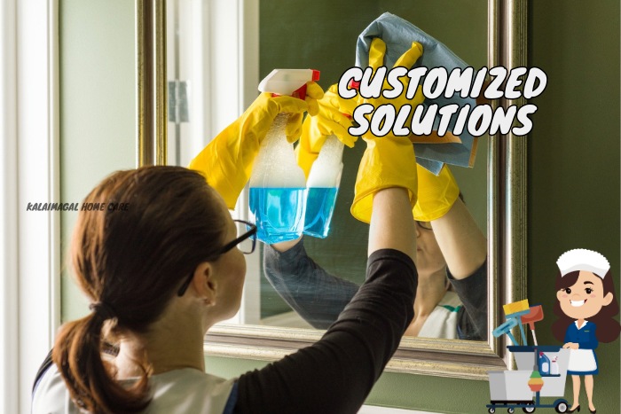 Woman cleaning a mirror with precision and care, highlighting the customized cleaning solutions provided by Kalaimagal Home Care in Coimbatore for a spotless home environment
