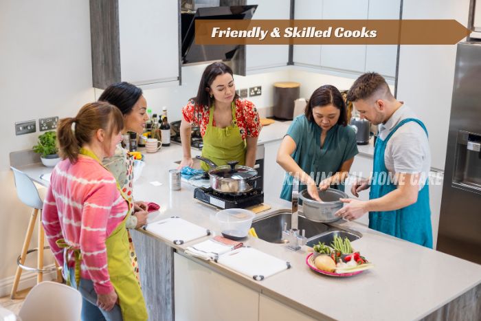 Friendly and skilled home cooks preparing fresh meals in a modern kitchen at Kalaimagal Home Care’s Coimbatore 