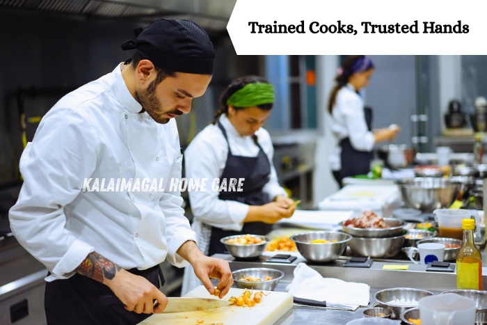 Professional cooks preparing meals in a clean kitchen – Kalaimagal Home Care in Coimbatore offers reliable and experienced Home Cook services